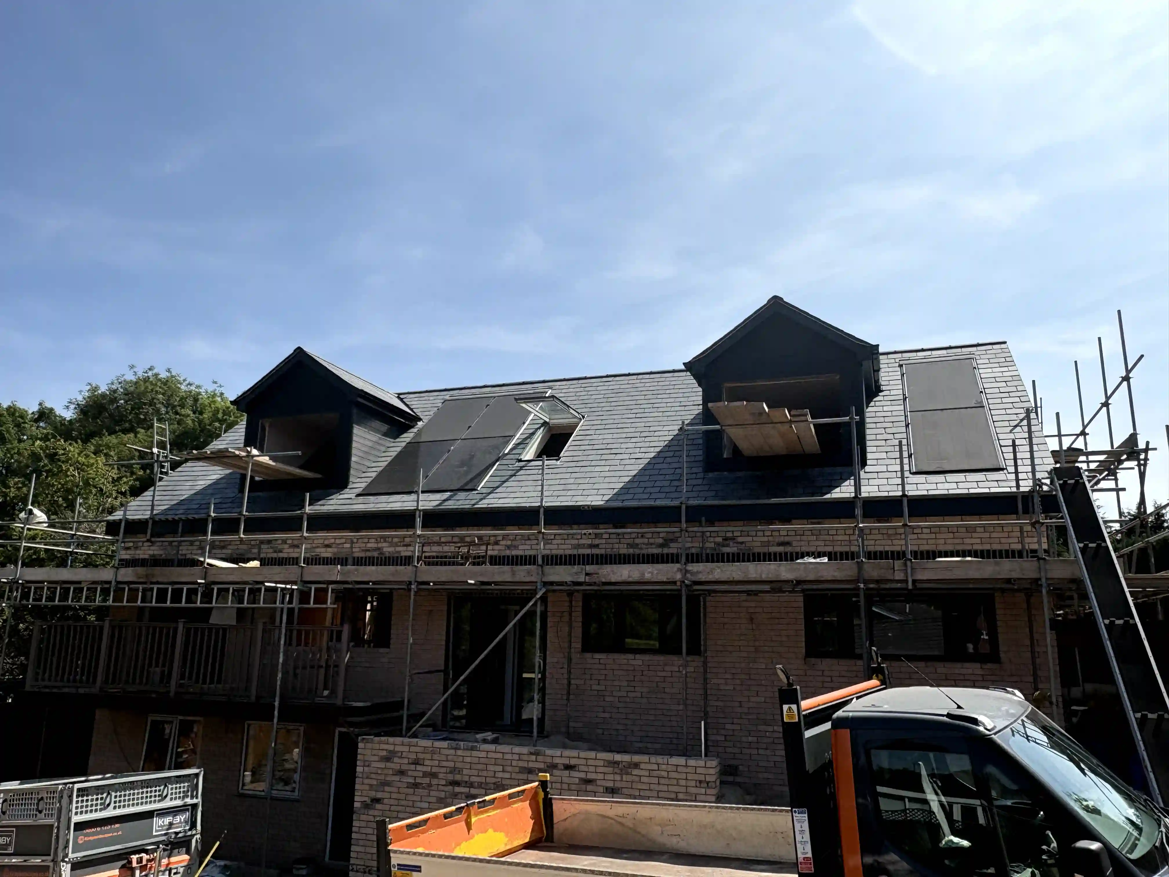 Natural slate new build — dormer gables and slate detail